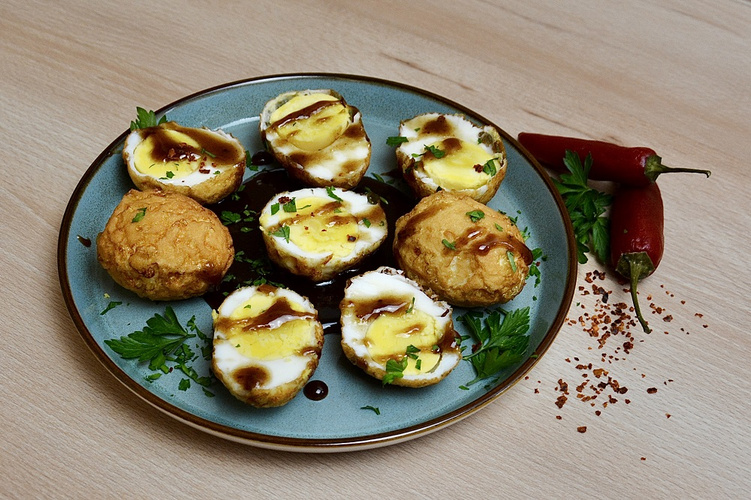 Rezeptbild für Frittierte Eier - Khai Luk Koei